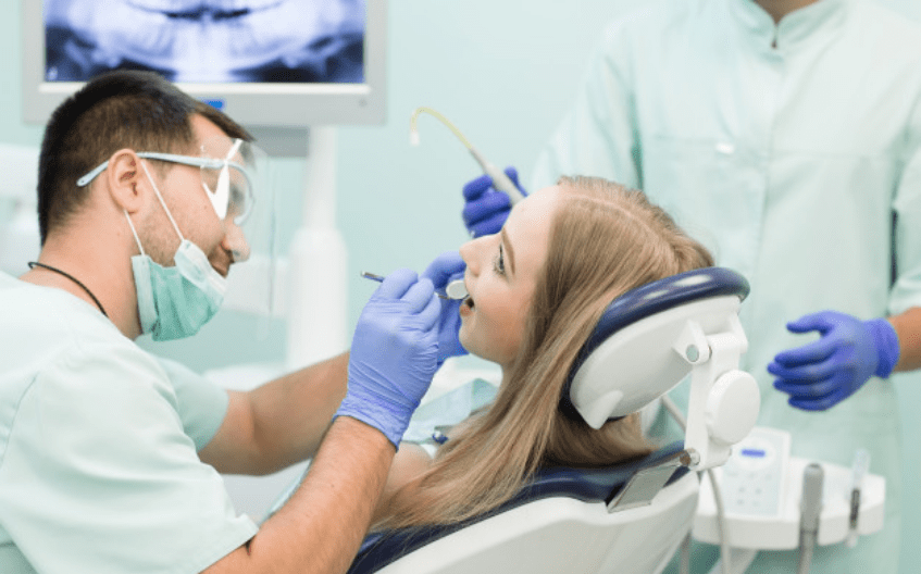 dentist checking patient